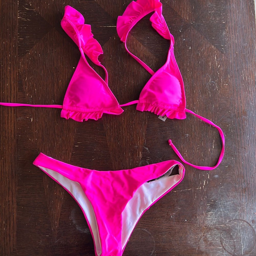 Hot pink triangle bikini with ruffle detail